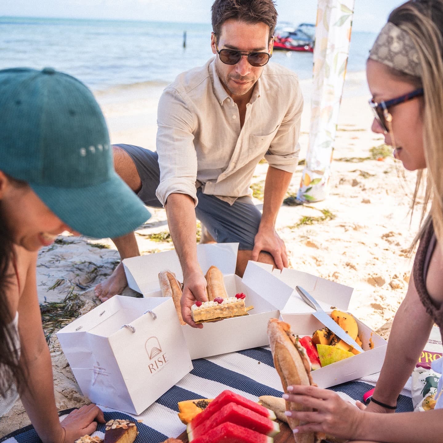 Jeremy with guests on the water
