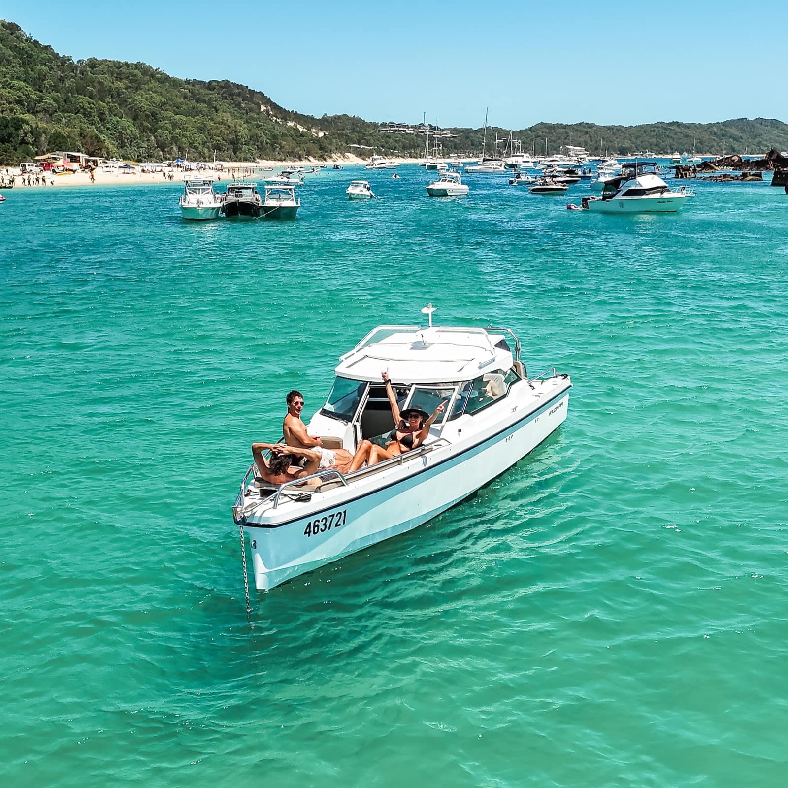 Aerial view of the Sea La Vie Axopar 24 anchored in the turquoise water of Moreton Bay